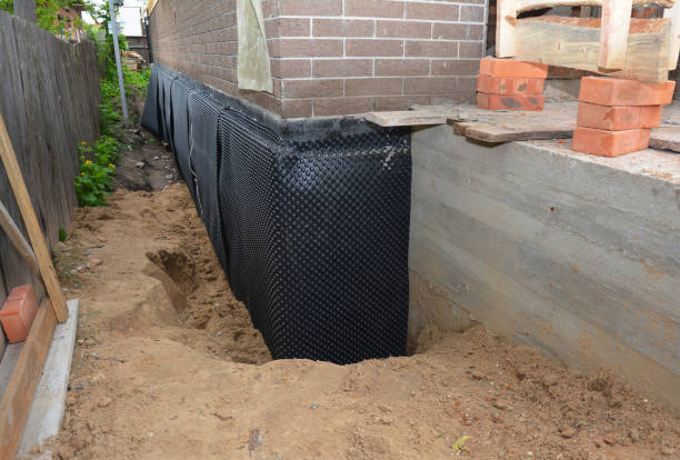 Happy homeowners after waterproofing job in Alexander City